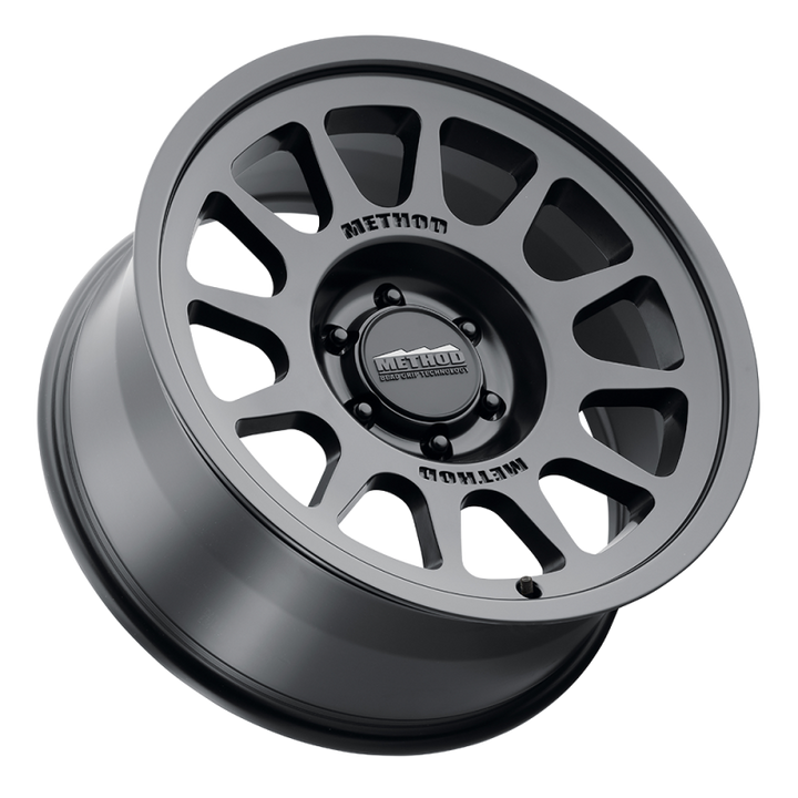 Method MR703 Bead Grip 18x9 12mm Offset 6x135 87mm CB - Matte Black